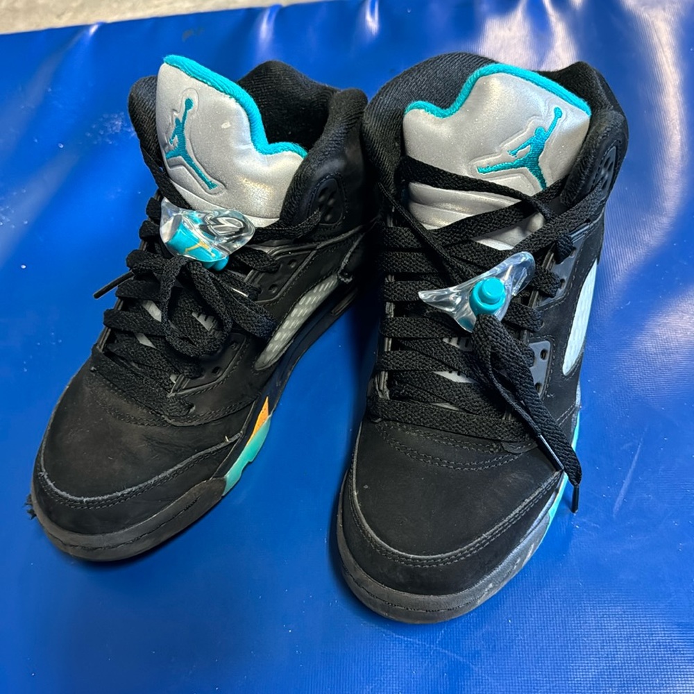 Suede Jordan’s black with aqua and orange